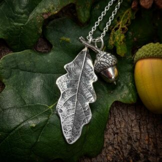 Oak-leaf-acorn-necklace-natural-background-2