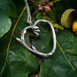 Oak-twig-heart-necklace-natural-background-2