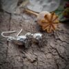 poppy-head-drop-earring-natural-background-1