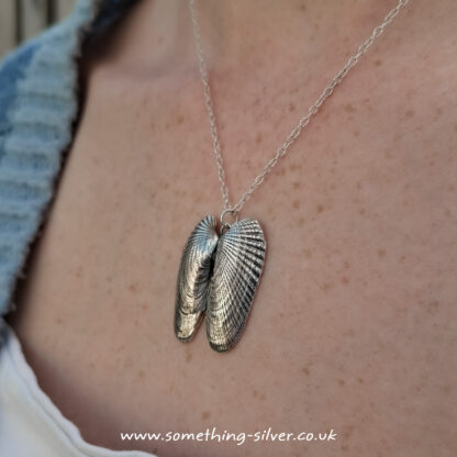 Double-Angel-Wing-Pendant-on-neck